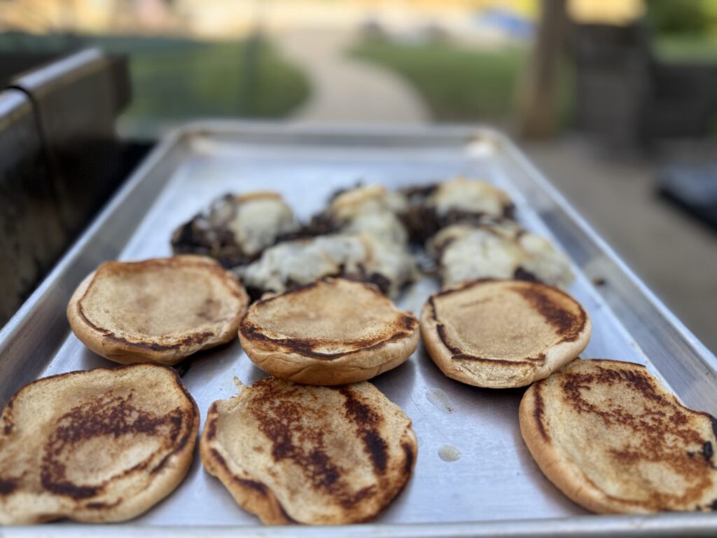 finished smashburgers with toasted buns
